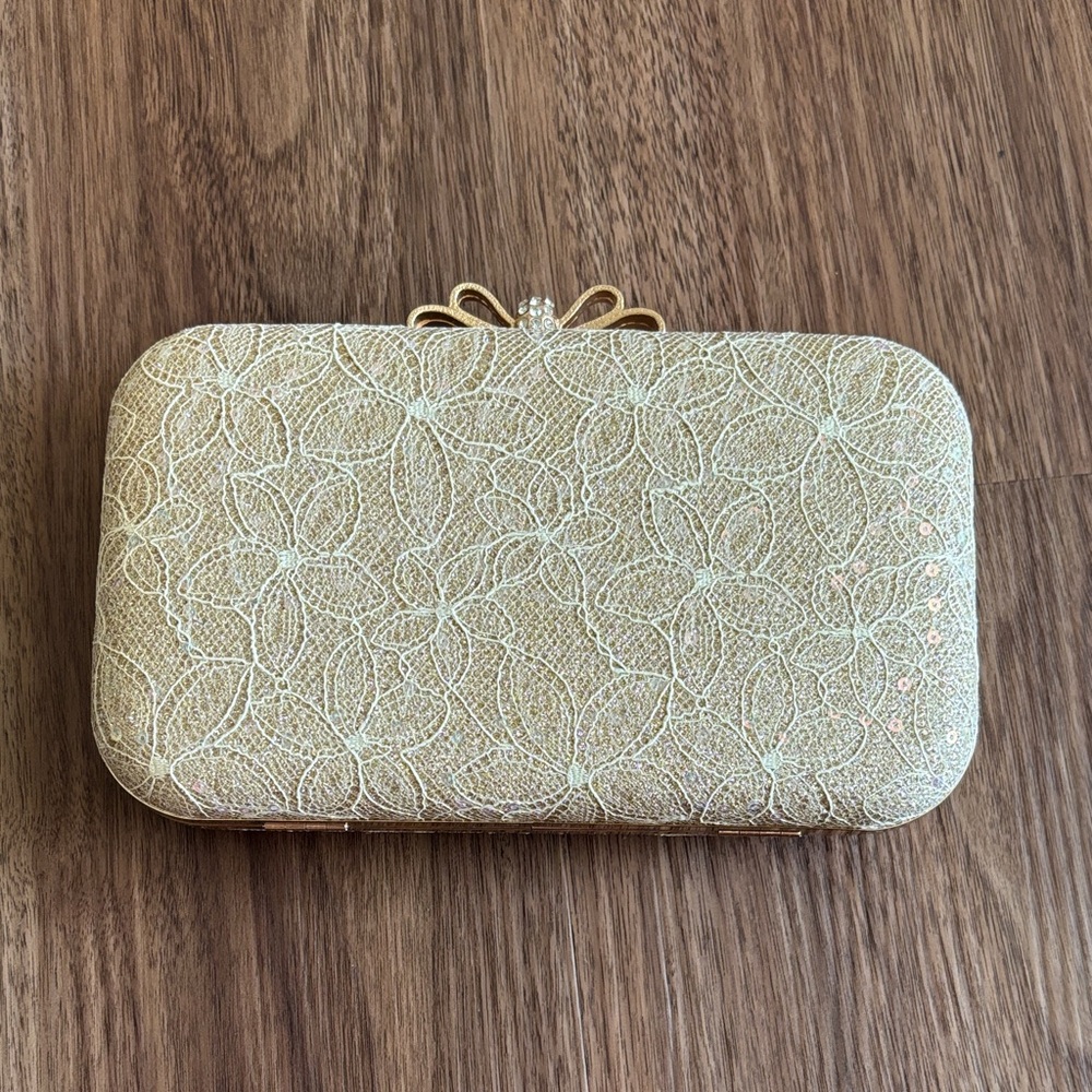 Elegant Gold Clutch with Floral Design